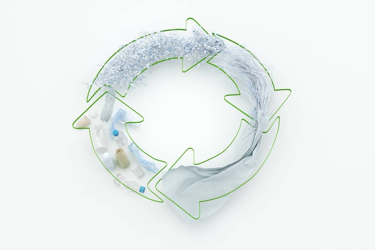 Circular economy symbol represented with plastic products